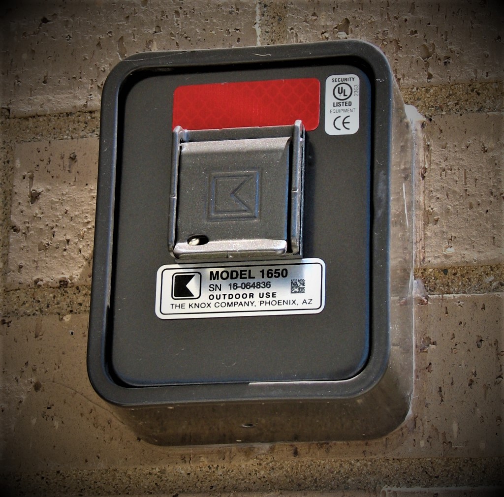 Knox box located on a brick wall